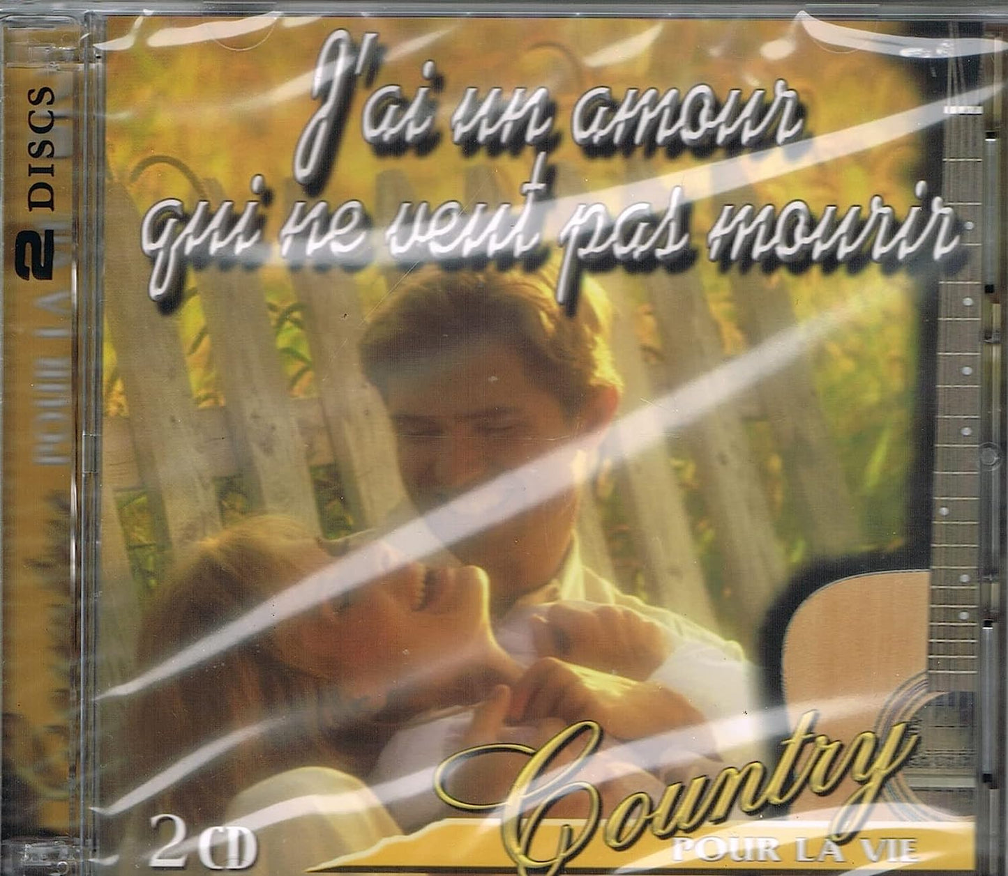 40 Plus Grands Succes Country (incluant 40 Chansons 4 CD / Country Pour La Vie - Un jour a la Fois & J'ai Un Amour Qui Ne Veut Pas Mourir) [audioCD] Artistes Variés